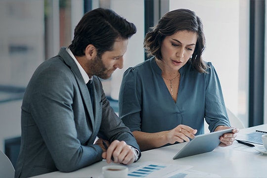 Man and woman walking mid-conversation