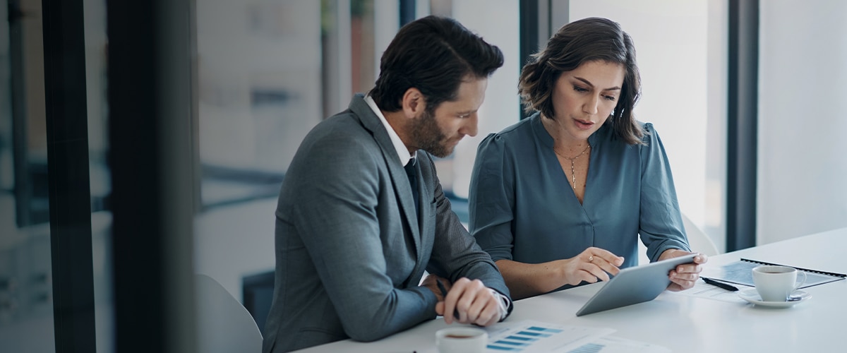 Man and woman walking mid-conversation