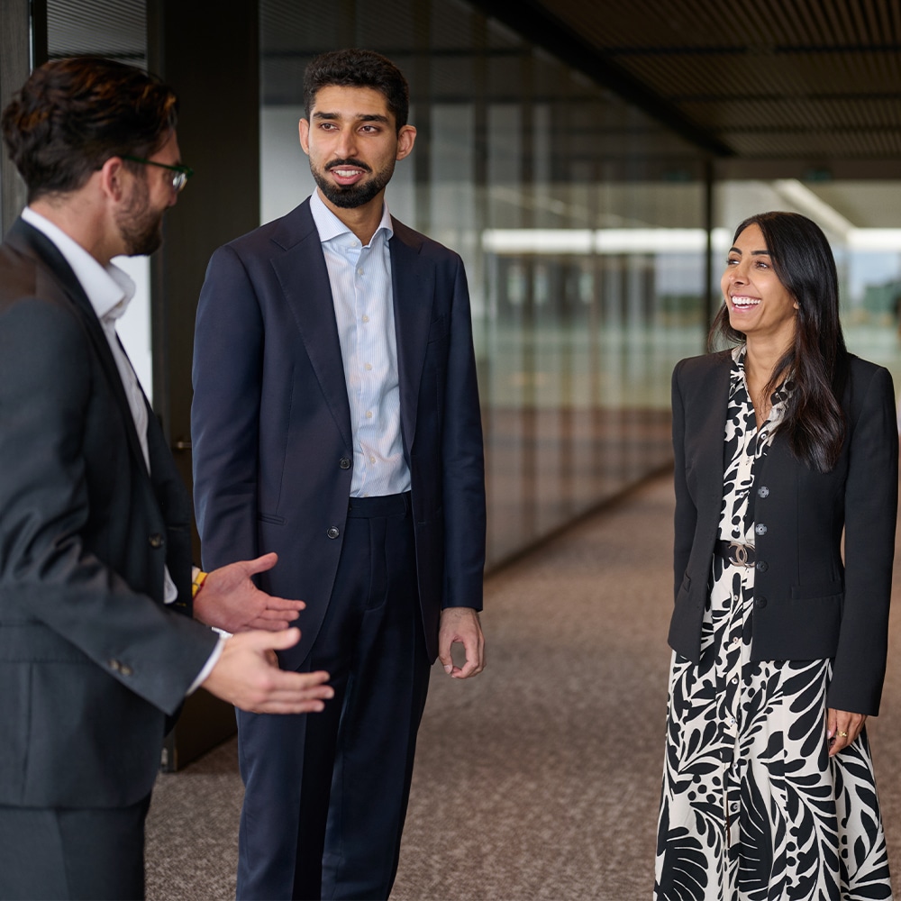 Group of colleagues mid-conversation