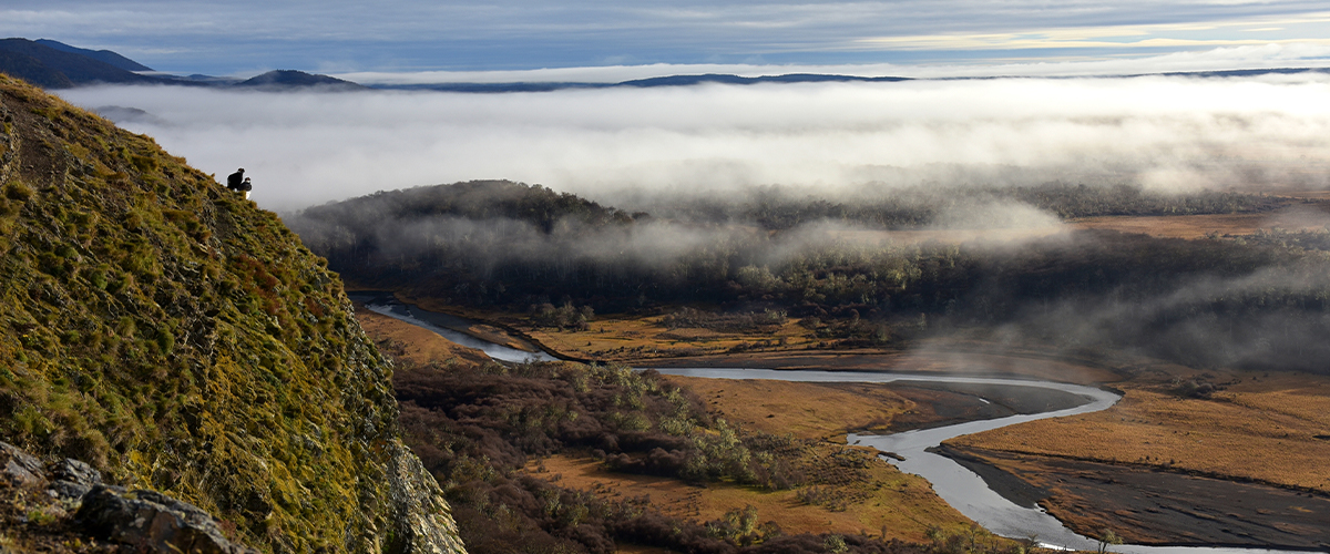 Vast landscape with a river and mountains